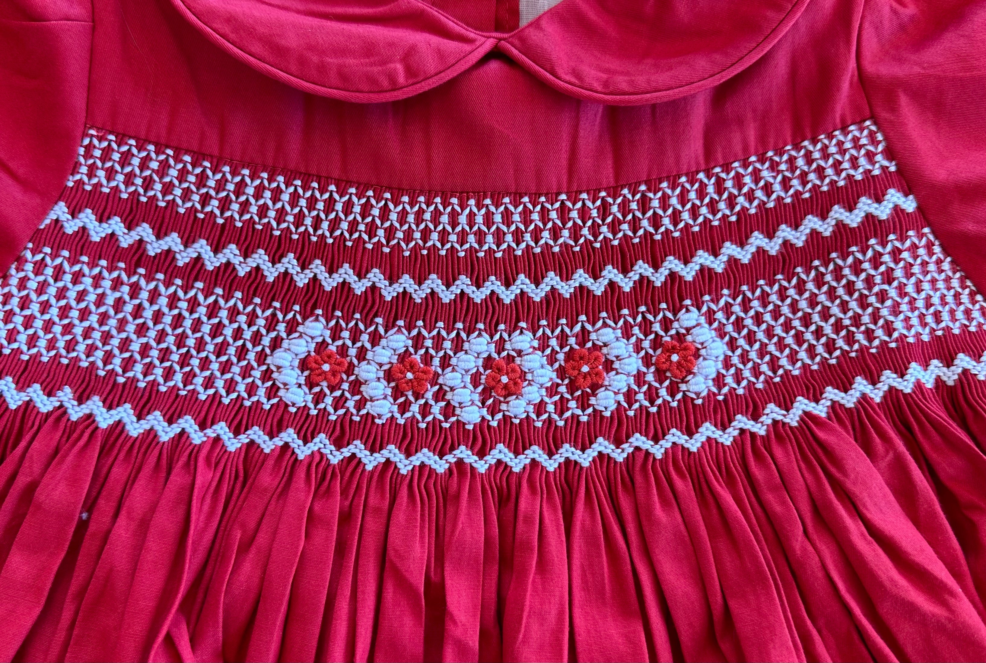 Baby frock 2025 smocking designs